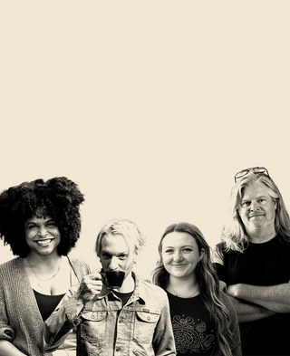 Black and white image of Vita employees and suppliers