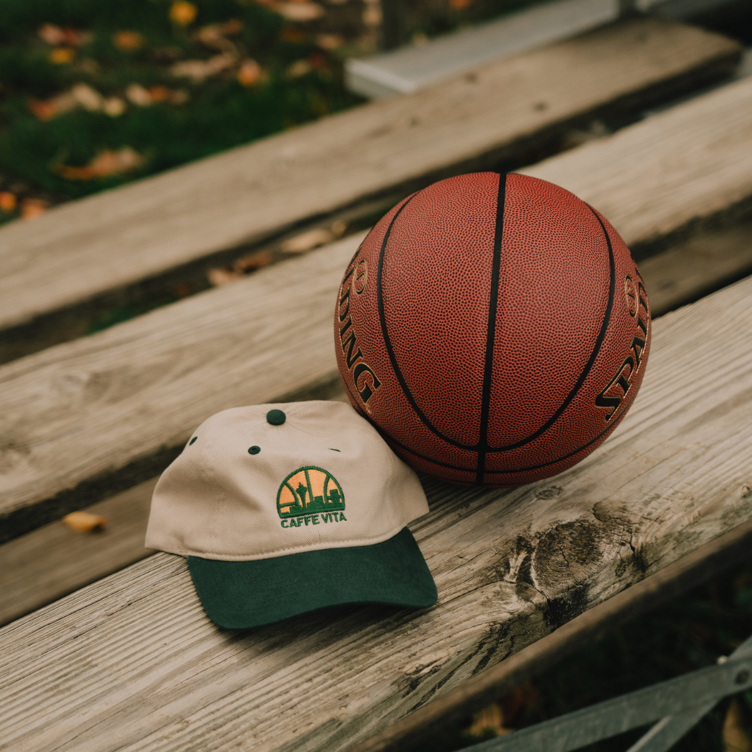 Image: sonics cap next to basketball