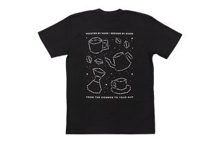 Black t-shirt with white geometric star design and text.