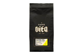 Black coffee bag with 'Caffe Vita' branding 
