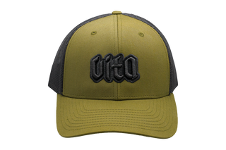 Green trucker hat with black mesh back and black Vita logo patch