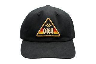 Black dad hat with triangle patch featuring Vita sunset logo and illuminati eye