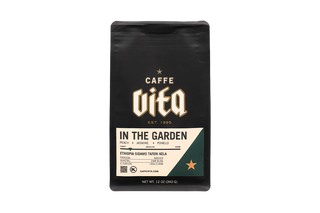 Caffe Vita coffee bag labeled 'In the Garden' no background