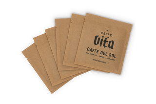 Stack of packets of Instant Caffe Del Sol, no background.