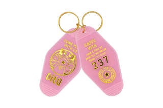 Pink motel style keychain, front and back, with double Pulcinella, Come Play With Us, Capitol Hill address, 237, and Coffee For Life logo