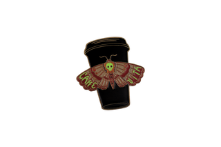 Enamel pin with disposable coffee cup with moth design that says 'CAFFE VITA' in glow-in-the-dark effect.