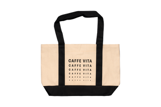Beige tote bag with black handles and 'CAFFE VITA' text.
