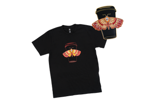 Moth design on black t-shirt and enamel pin juxtaposed with no background. 
