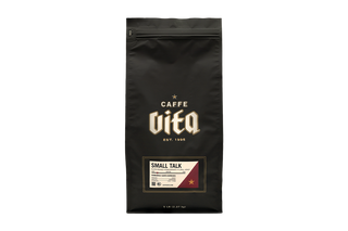 Black coffee bag of Small Talk with 'Caffe Vita' branding no background